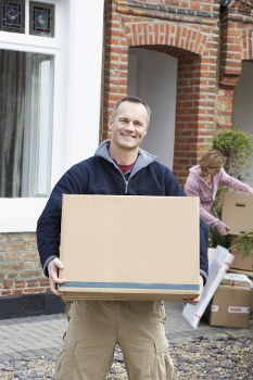 Moving van safety and team loading furniture carefully