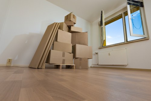 Local moving service navigating a residential East London street