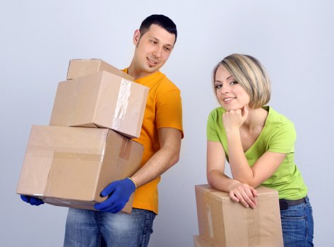 Packing boxes and furniture ready for local removals