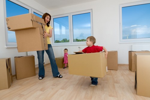 Household items being carried during a Forest Gate relocation